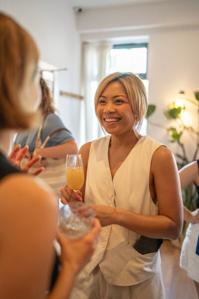 Asian woman attending a community event