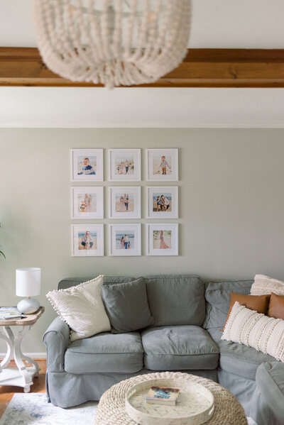 gallery wall of framed family photos