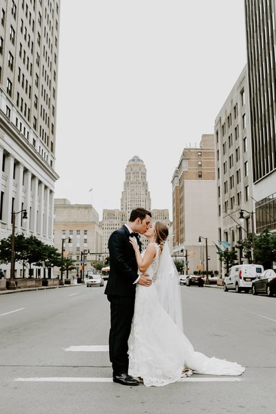 Bride and groom walk up memorial steps at their DC wedding