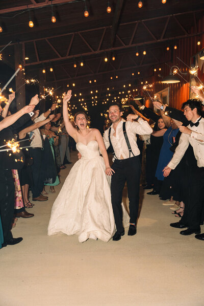 A bride and groom sparkler send off at Hidden Hill Venue.