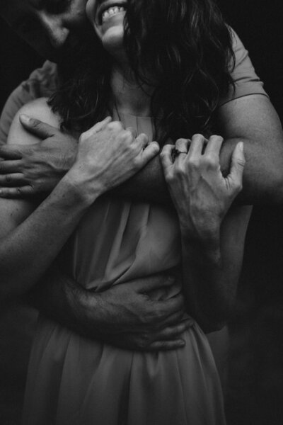 man holding a woman