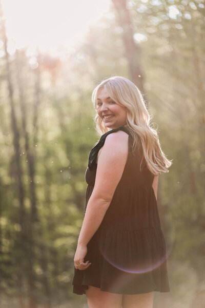 Senior in the woods with black dress | Senior Portraits