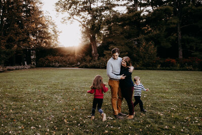 family embracing during photoshoot