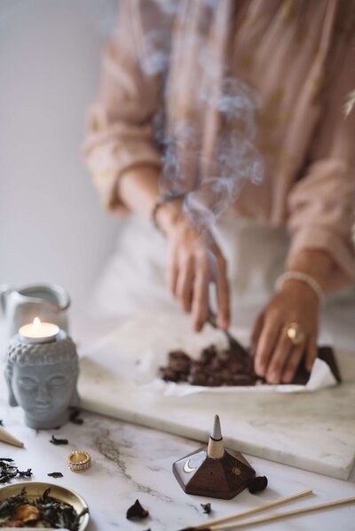 A cacao ceremony is a gentle shamanic healing practice that fosters emotional connection and heart-opening without hallucinogenic or out-of-body effects.