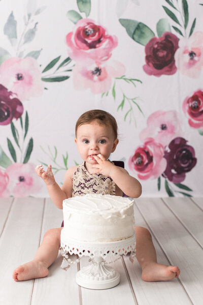 1 year old girl in kelowna for her floral cake smash