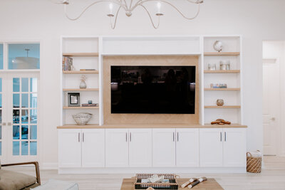 Custom built-ins, accent walls, and detailed carpentry designed and installed to fit your space perfectly by Holling Home Interiors.