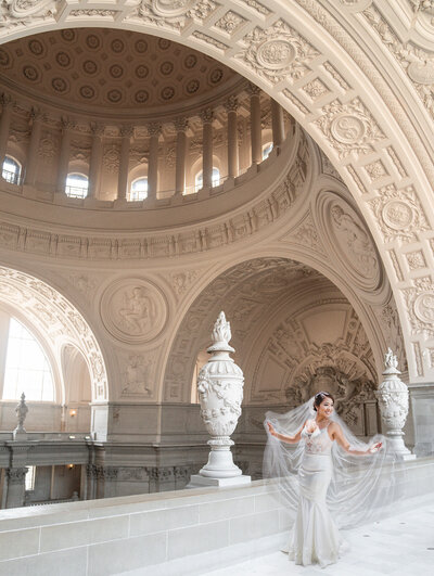 SF city hall wedding photographer - bride -at - the- balcony
