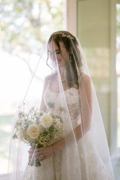 Bride and groom in field
