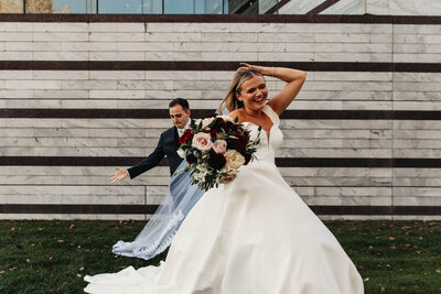 Winter Wedding portrait of couple hugging in downtown Akron at locke 4