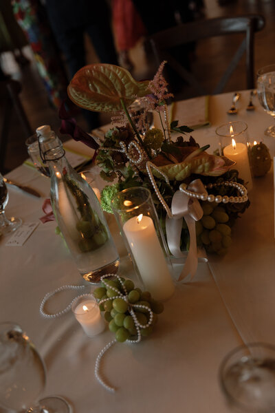 Candle-lit dinner during luxury wedding at The Black Canyon Inn in Estes Park, photographed by a Denver-based wedding photographer. 