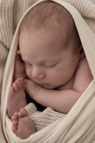Newborn Baby wrapped in blanket