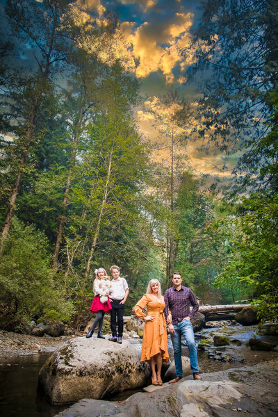 family standing near a creek
