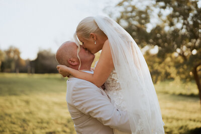 Bride posing for a portrait at her Adelaide wedding, captured by JakeyVass Media