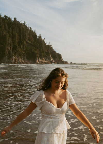 girl standing on bridge in columbia river gorge in oregon