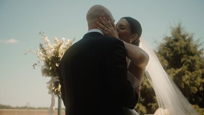 bride and groom kissing