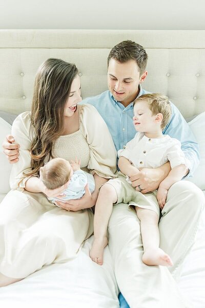 Family photo with newborn and toddler in home near Greenville, NC