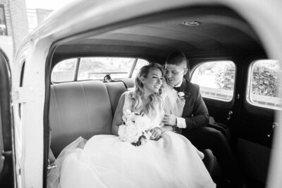 bride walks down grand staircase on way to ceremony
