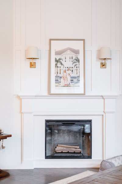 beautiful home fireplace with heirloom luxury statement wall art of a family portrait