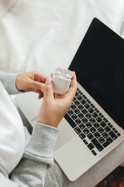 Airpods + Computer - Organizational Change Coach in Denver, Co- Elle Banks Coaching