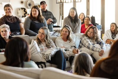 group of women listening to a training