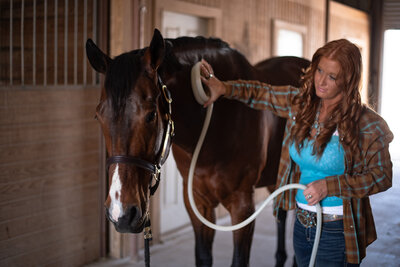 Women doing a PEMF session on horse