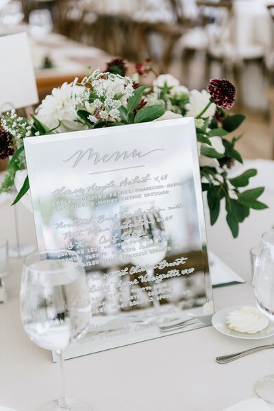 Mirror menu sign with calligraphy  for wedding at Mount Hope Farm in Rhode Island