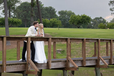 Bride and Groom on Peachtree Golf Club Bridge
