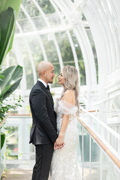 bride and groom portrait inside the mont royal green house | luxury wedding photographer