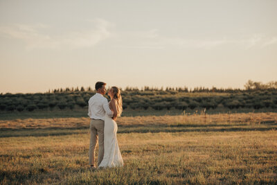 An emotional first look moment between bride and groom, captured in Spokane, WA with a nostalgic, cinematic touch.