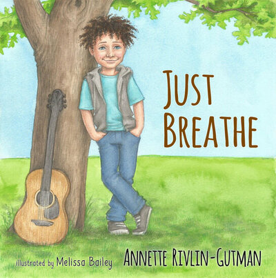 Cover for book, kid standing in front of a tree with his guitar propped up against tree.