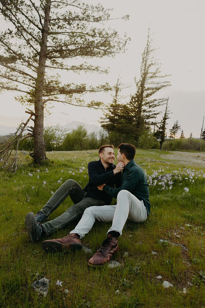 couple kisses in forest