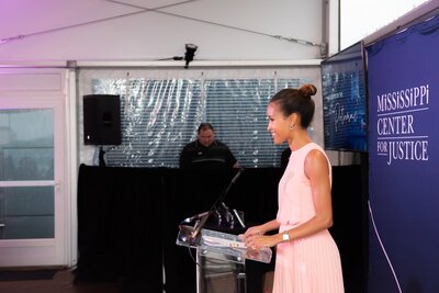 Adrianna Hopkins serves as emcee for the Mississippi on the Potomac event
