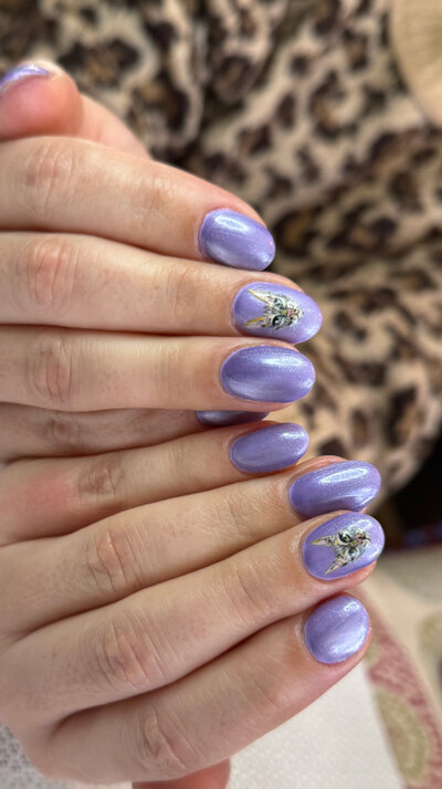Nails by Kristal purple with detailed artwork