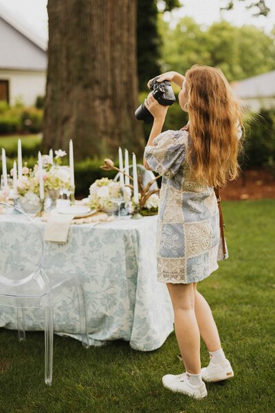 photographer taking picture of table