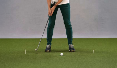 Renee O’Higgins, PGA and LPGA golf instructor posing for putting drill for Golf Digest+