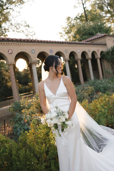 bride and groom running toward camera on elopement day
