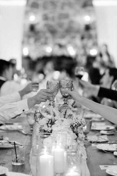 Bride jumps into groom's arms on dance floor at Glen Foerd Estate in Philadelphia, PA