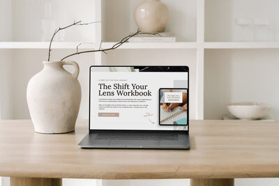 Lumen template home page on a desktop device sitting on a table