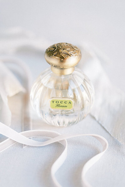 A detail image of a bride's perfume