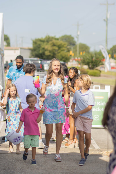 Families and children walking into a non-denominational church in Fayetteville, NC.