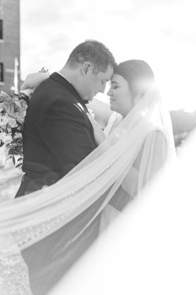 Bride and groom walk up memorial steps at their DC wedding