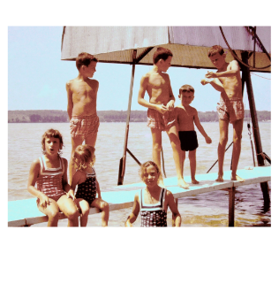 Young children playing on vintage boat