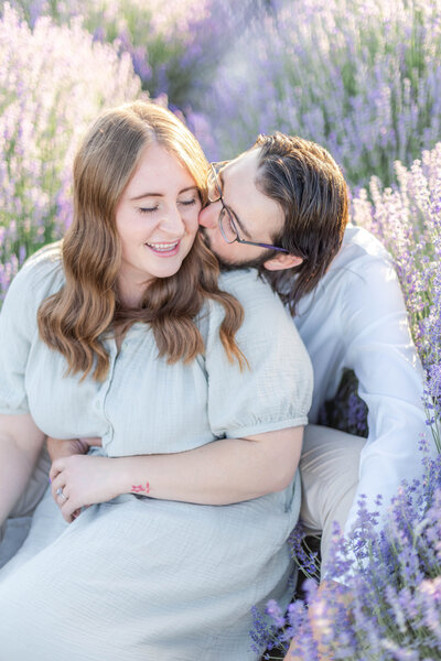 Dreamy outdoor engagement photos in Utah with golden hour lighting, capturing genuine laughter, intimate moments, and stunning lavender. Ideal for couples planning a timeless photo session.