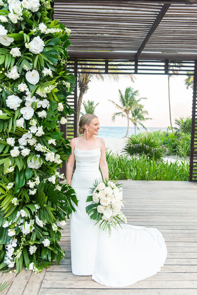 bride posing with bouquet