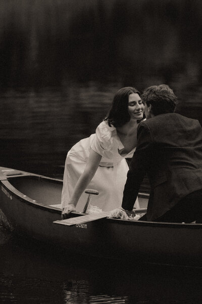 groom dipping his bride after their first dance 