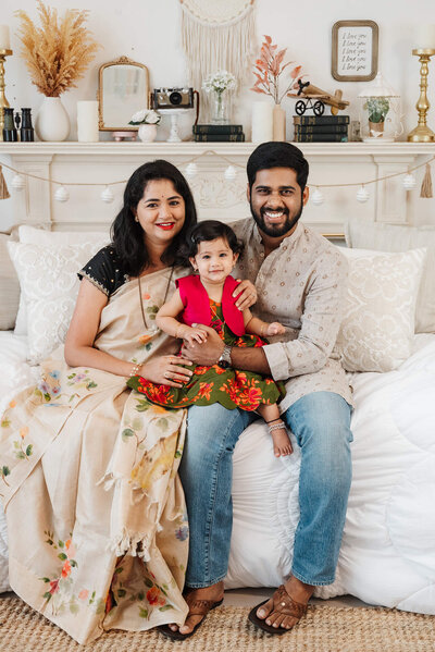 Mom embraces toddler girl in Atlanta Family Photography session.