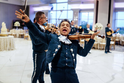 Mariachi violinist playing at wedding reception in Chicago