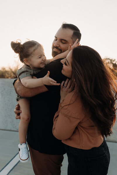 gainesville family photos with mother father and daughter