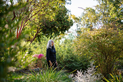 Audrie Meyer in nature, symbolizing spiritual coaching for healing from trauma and thriving beyond your past.