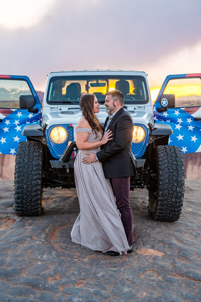 Engagement photos of a couple and their jeep